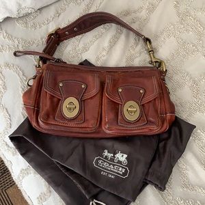 Coach handbag brownish red. Good used condition.